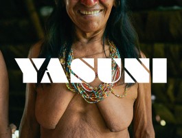 Indigenous woman from Yasuni wearing colorful traditional beaded necklace. 